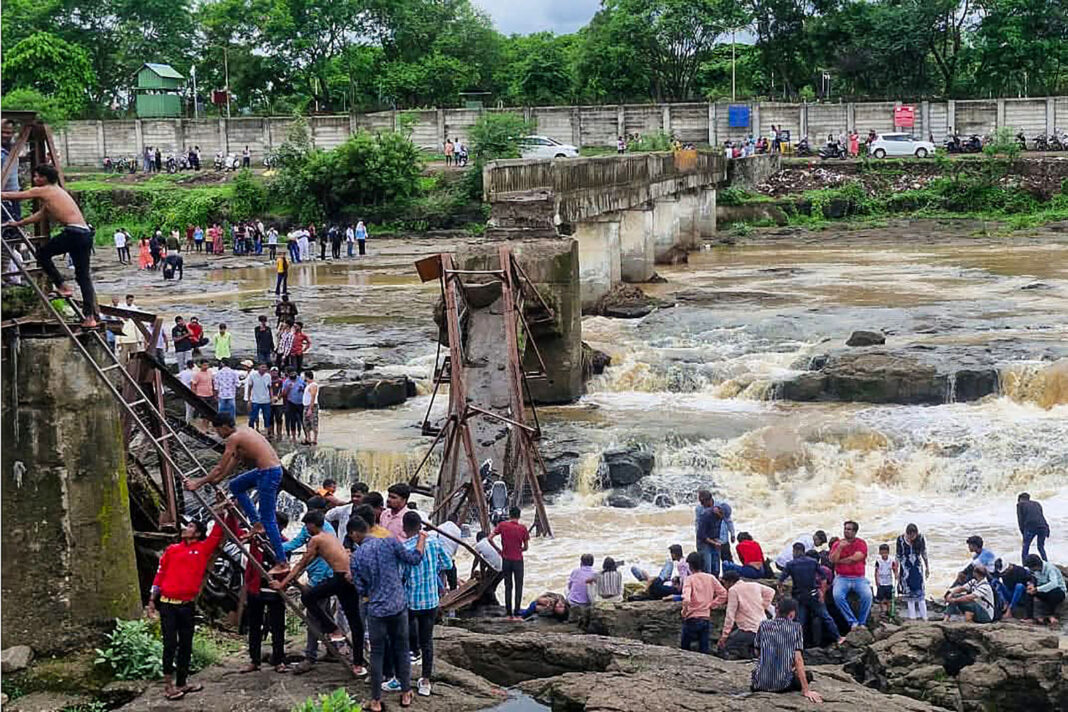 2 killed and 32 injured after a bridge collapses at a tourist destination in western India