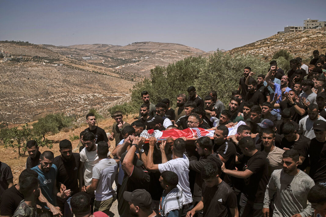 Israeli settlers rampage at a military base in the West Bank