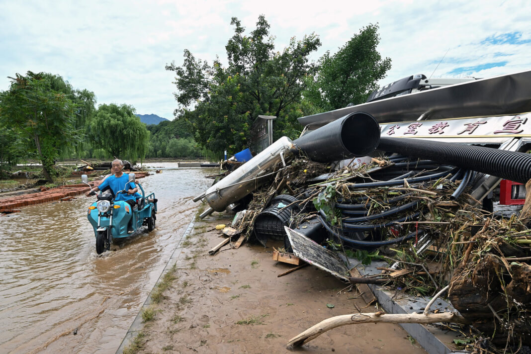 Flooding kills at least 38 as Beijing region gets almost a year's worth of rain